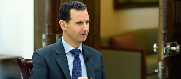 Bashar Asad, presidente sirio, durante la entrevista con la agencia Sputnik - Sputnik Mundo