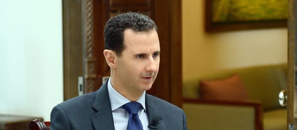Bashar Asad, presidente sirio, durante la entrevista con la agencia Sputnik - Sputnik Mundo