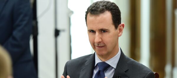 Bashar Asad, presidente sirio, durante la entrevista con la agencia Sputnik - Sputnik Mundo