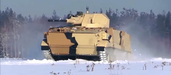 Un vehículo blindado ruso, aún no identificado, demostró sus capacidades militares en un vídeo publicado en las redes sociales Un vehículo blindado ruso, aún no identificado, demostró sus capacidades militares en un vídeo publicado en las redes sociales - Sputnik Mundo