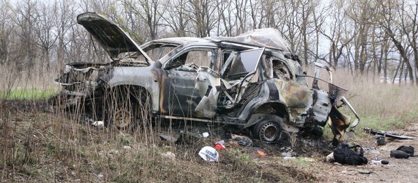 Lugar de explosión de un coche de la OSCE - Sputnik Mundo