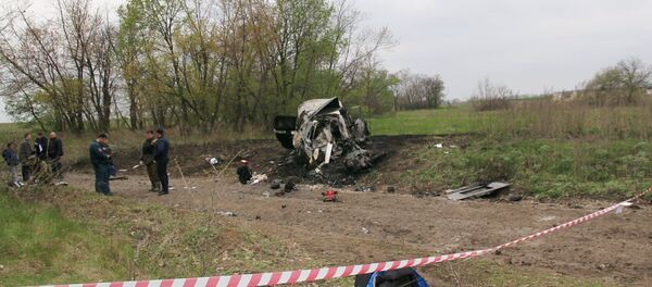 Lugar de explosión de un coche de la OSCE - Sputnik Mundo