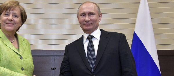 Angela Merkel, canciller de Alemania, y Vladímir Putin, presidente de Rusia - Sputnik Mundo