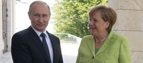 Angela Merkel, canciller de Alemania, y Vladímir Putin, presidente de Rusia - Sputnik Mundo