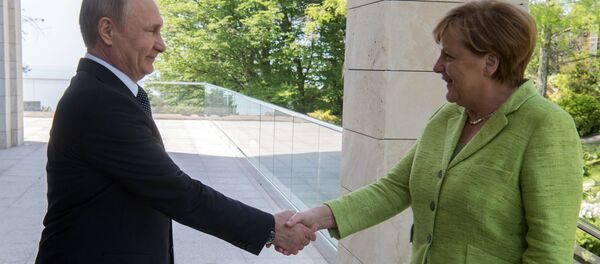 Angela Merkel, canciller de Alemania, y Vladímir Putin, presidente de Rusia - Sputnik Mundo