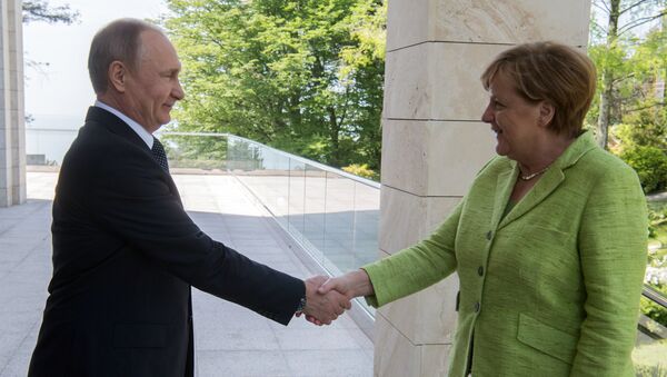 Angela Merkel, canciller de Alemania, y Vladímir Putin, presidente de Rusia Angela Merkel, canciller de Alemania, y Vladímir Putin, presidente de Rusia - Sputnik Mundo