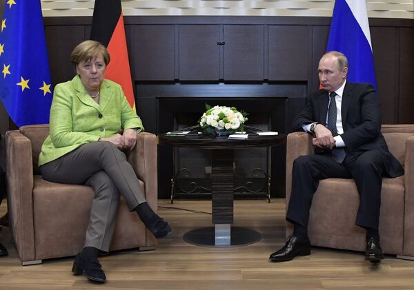 Angela Merkel, canciller de Alemania, y Vladímir Putin, presidente de Rusia - Sputnik Mundo