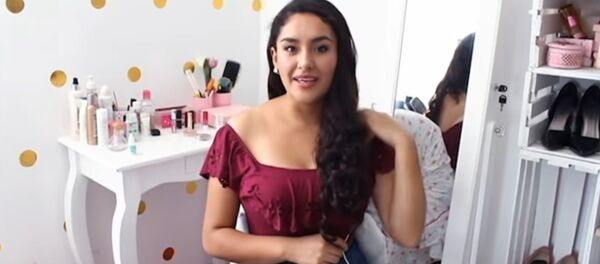 Kusy Tatiana en un momento del vídeo - Sputnik Mundo