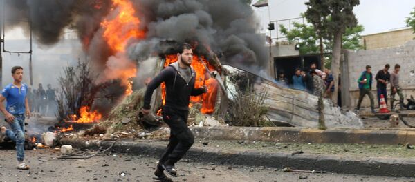 La explosión de un coche bomba en Siria  - Sputnik Mundo