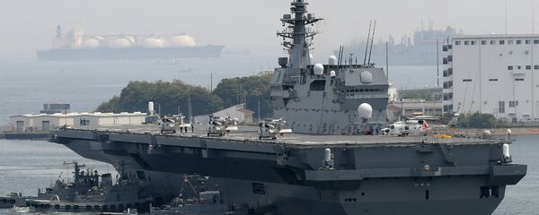 El portahelicópteros japonés Izumo El portahelicópteros japonés Izumo - Sputnik Mundo