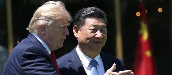 Donald Trump, mandatario de EEUU, y Xi Jinping, presidente de China Donald Trump, mandatario de EEUU, y Xi Jinping, presidente de China - Sputnik Mundo