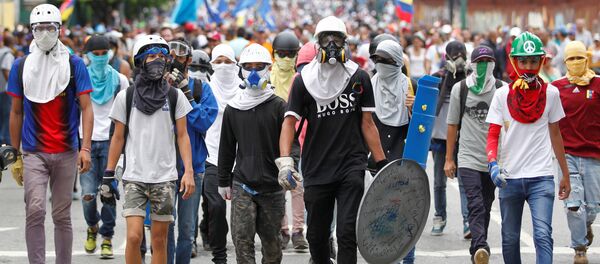 Una manifestación antigubernamental en Caracas - Sputnik Mundo