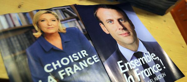 Marine Le Pen y Emmanuel Macron, candidatos a la presidencia de Francia - Sputnik Mundo