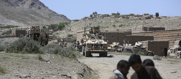 Fuerzas estadounidenses y tropas afganas - Sputnik Mundo