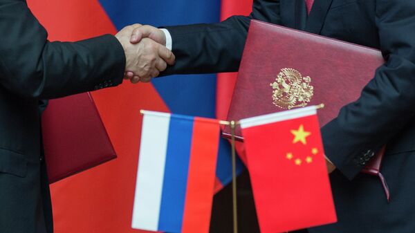 Las banderas de Rusia y China - Sputnik Mundo