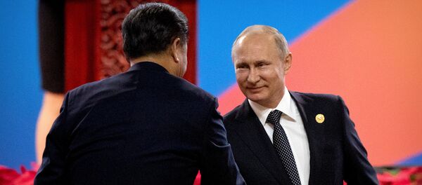 Xi Jinping, presidente de China y Vladímir Putin, presidente de Rusia - Sputnik Mundo