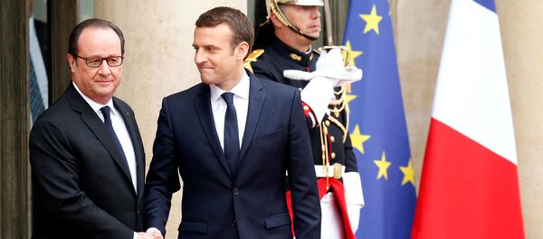 Francois Hollande y Emmanuel Macron - Sputnik Mundo