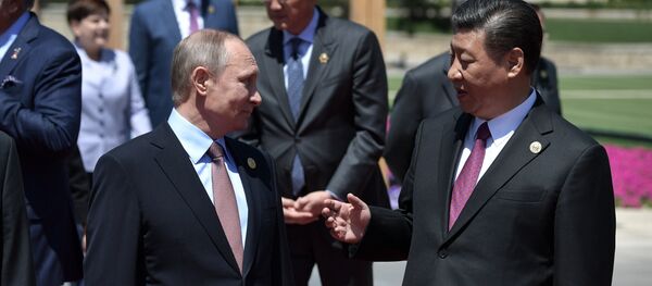 Presidente ruso, Vladímir Putin y presidente chino Xi Jiping - Sputnik Mundo
