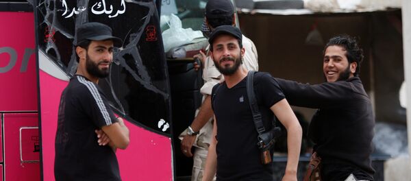 Los radicales y sus familiares abandonan Homs, Siria - Sputnik Mundo