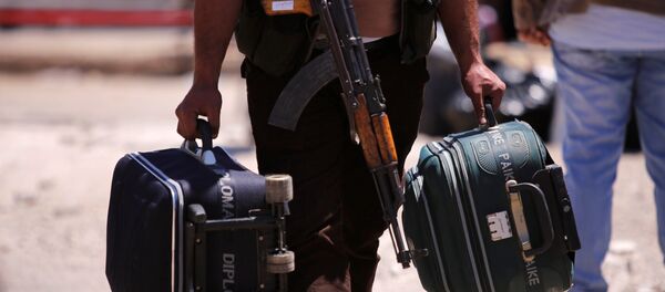 Los radicales y sus familiares abandonan Homs, Siria - Sputnik Mundo