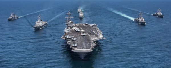 In this image released by the U.S. Navy, the aircraft carrier USS Carl Vinson, flanked by South Korean destroyers, from left, Yang Manchun and Sejong the Great, and the U.S.Navy's Wayne E. Meyer and USS Michael Murphy, transit the western Pacific Ocean Wednesday, May 3, 2017. - Sputnik Mundo