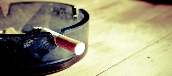 Un cigarillo - Sputnik Mundo