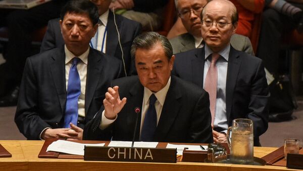 Wang Yi, ministro de Exteriores de China - Sputnik Mundo