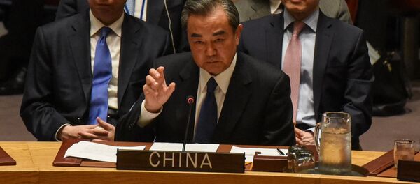 Wang Yi, ministro de Exteriores de China - Sputnik Mundo
