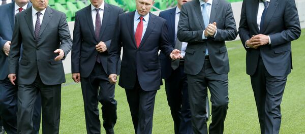 Vladímir Putin, presidente de Rusia, junto a Gianni Infantino, presidente de la FIFA - Sputnik Mundo