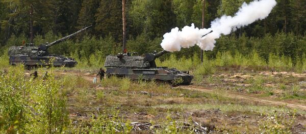 Tanques alemanes durante los ejercicios de la OTAN en Lituania - Sputnik Mundo