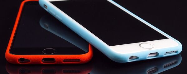 Dos smartphones Dos smartphones - Sputnik Mundo