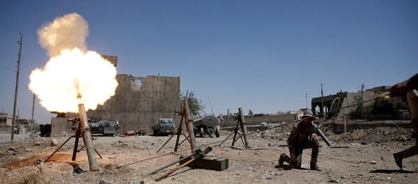 Militares iraquíes durante los combates contra Daesh en Mosul, Irak - Sputnik Mundo