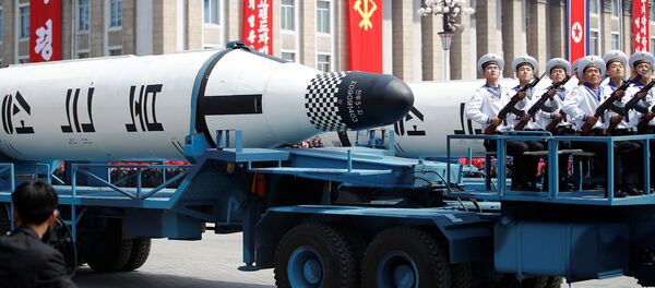 Military vehicles carry missiles with characters reading 'Pukkuksong' during a military parade marking the 105th birth anniversary of country's founding father, Kim Il Sung in Pyongyang, North Korea April 15, 2017. - Sputnik Mundo