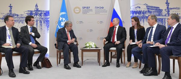 El presidente ruso, Vladímir Putin, y el secretario general de la ONU, Antonio Guterres - Sputnik Mundo