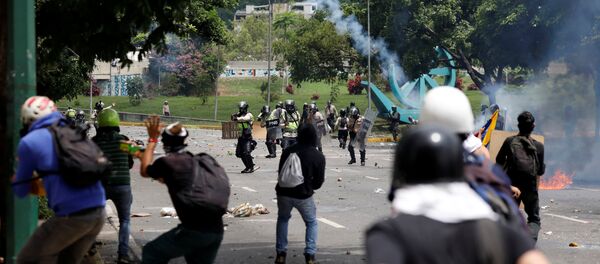 Enfrentamientos en Venezuela - Sputnik Mundo
