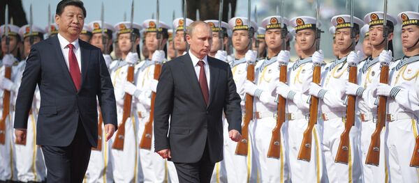 El presidente ruso Vladímir Putin y el presidente de China Xi Jinping - Sputnik Mundo