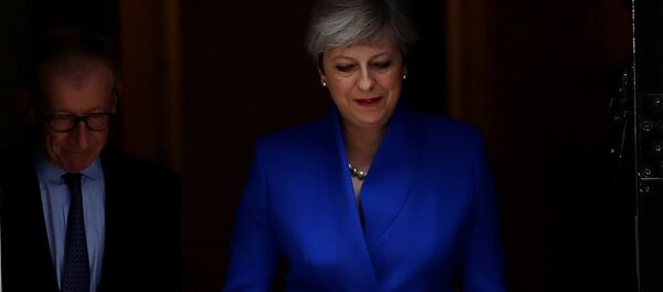 Britain's Primer Minister Theresa May leaves Downing Street on her way to Buckingham Palace after Britain's election in London, Britain - Sputnik Mundo