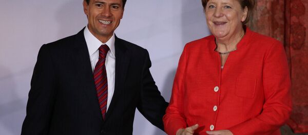 Angela Merkel, canciller alemana, y Enrique Peña Nieto, presidente de México - Sputnik Mundo