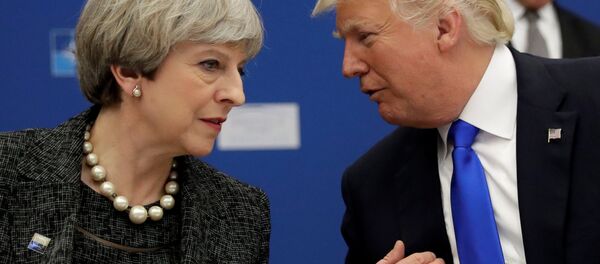 Presidente de EEUU, Donald Trump, y primera ministra del Reino Unido, Theresa May - Sputnik Mundo