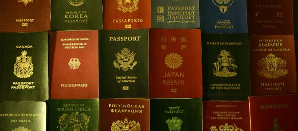 Pasaportes (imagen referencial) Pasaportes (imagen referencial) - Sputnik Mundo