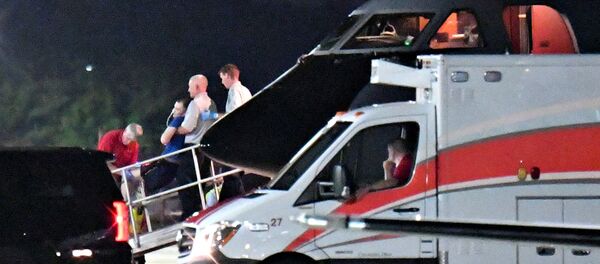 El traslado del inconciente estudiante estadunidense Otto Warmbier - Sputnik Mundo