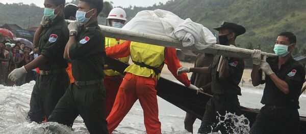 Hallan cuerpos de 90 pasajeros del avión militar estrellado en Birmania Hallan cuerpos de 90 pasajeros del avión militar estrellado en Birmania - Sputnik Mundo