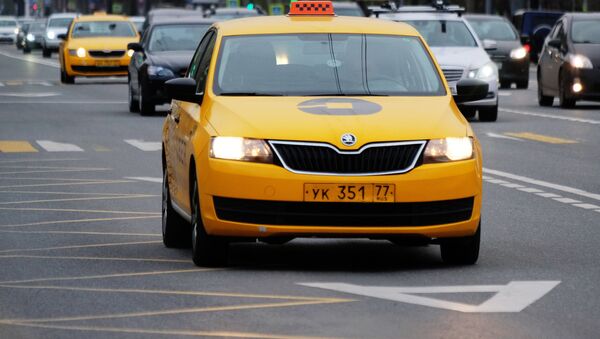 Un taxi - Sputnik Mundo