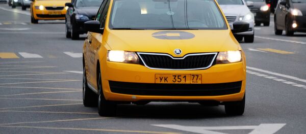 Un taxi - Sputnik Mundo