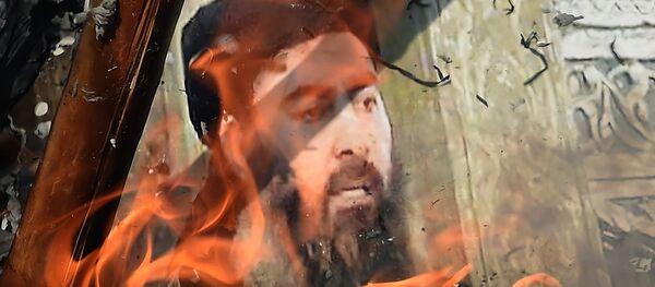 Foto de Abu Bakr al Bagdadi en llamas - Sputnik Mundo