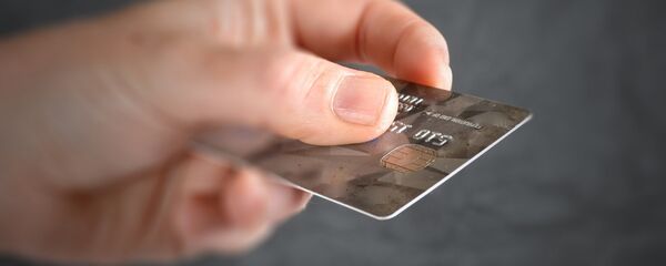 Una tarjeta de crédito - Sputnik Mundo