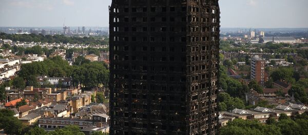 La torre Grenfell, en Londres, después del incendio - Sputnik Mundo