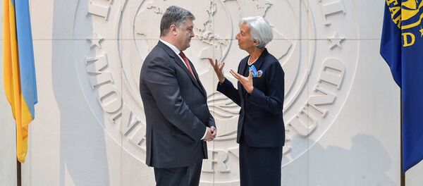Managing Director of the International Monetary Fund (IMF) Christine Lagarde talks to Ukrainian President Petro Poroshenko - Sputnik Mundo