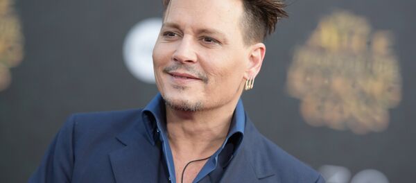 Johhny Depp en una imagen de archivo - Sputnik Mundo