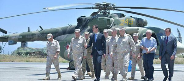 Presidente de Siria, Bashar Asad en la base rua Hmeymim - Sputnik Mundo